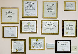 wall of credentials and laurels